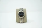 Seiko 7N42-8099 Titanium Quartz Watch Black Dial, Gold & Silver Two-tone, Date Pre-owned. Price: $130.00.